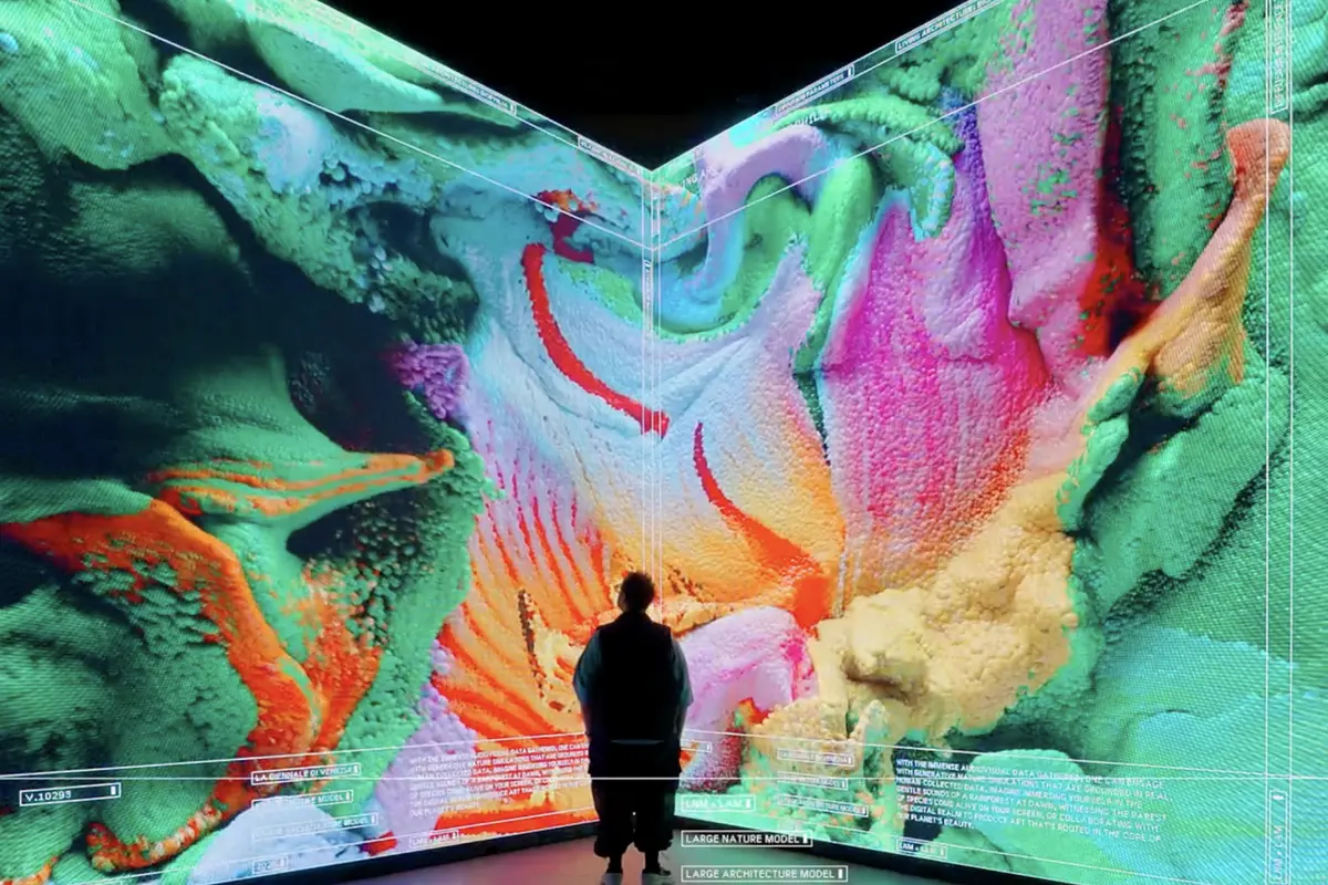 Refik Anadol, Large Nature Model — a visitor before the generative landscape